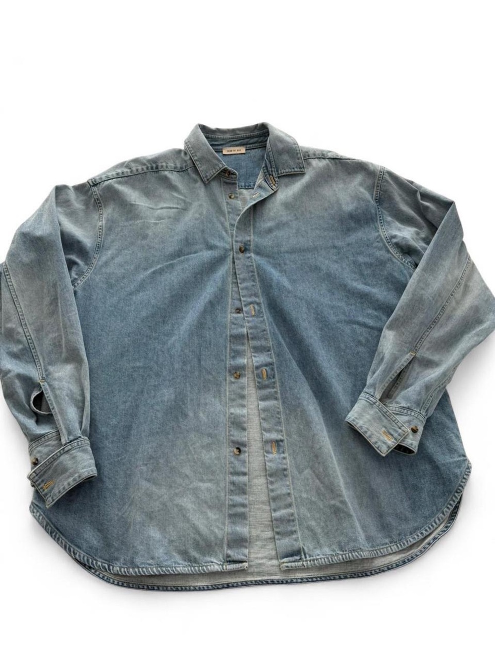 Fear of God Black Tag on Light Blue Denim